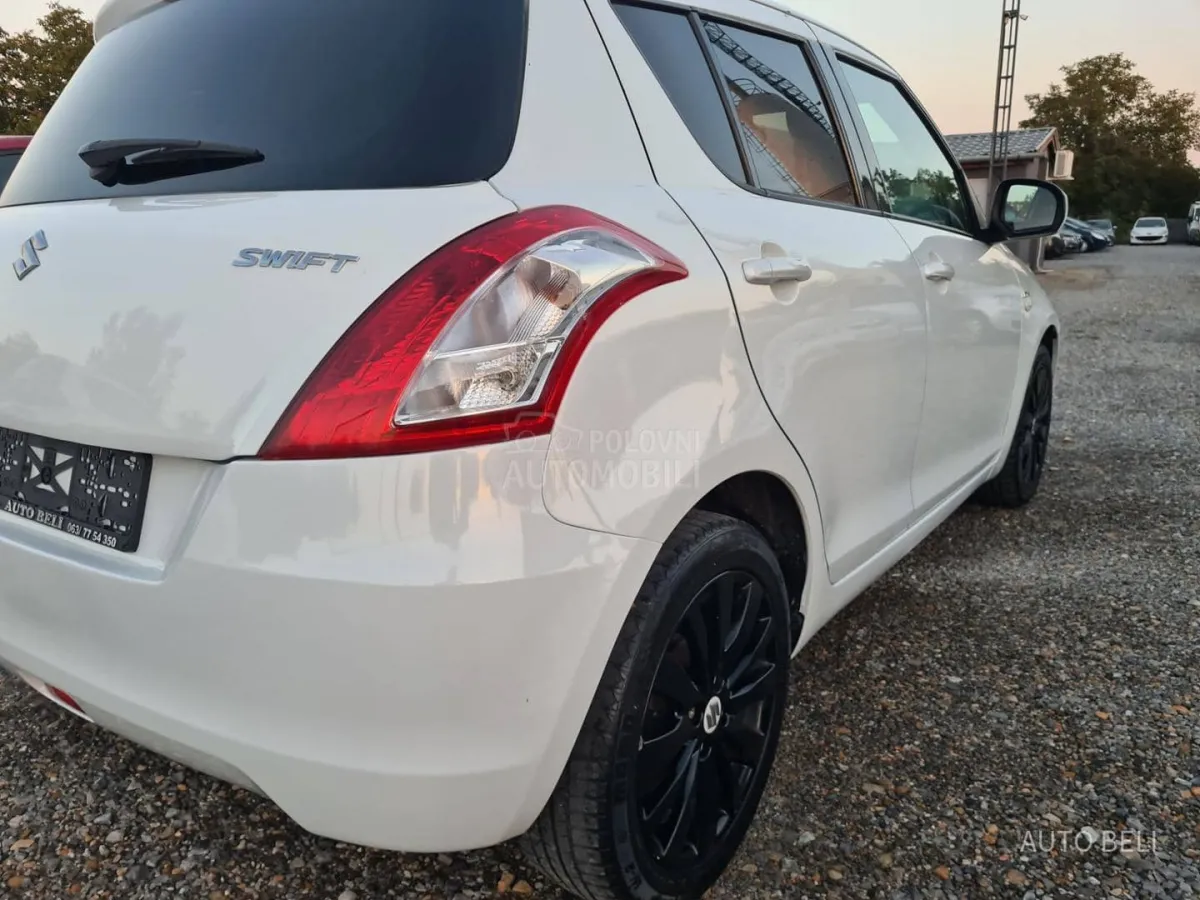 Suzuki Swift 1.3 ddis (2012) - slika 9